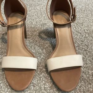 Old navy tan and white heels. Only worn 3 times.